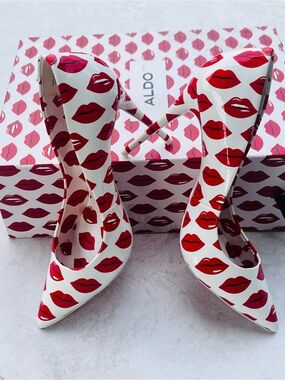 Aldo White Pointed Pumps with Red Lip Print